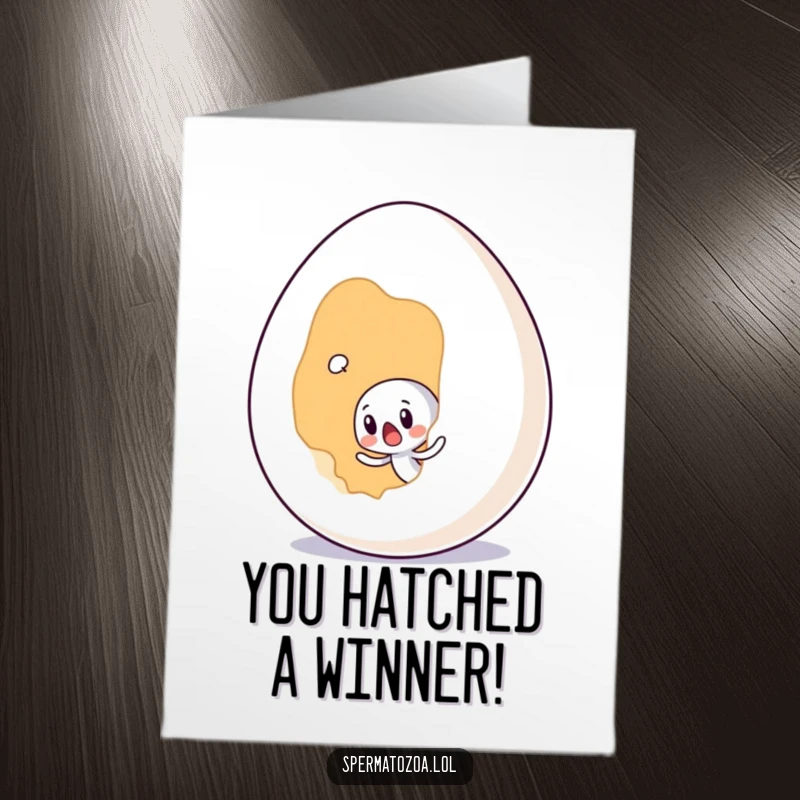 Funny Free Printable Sperm Congratulations Card features a tiny sperm character surprised by a giant egg, symbolizing a significant new beginning.